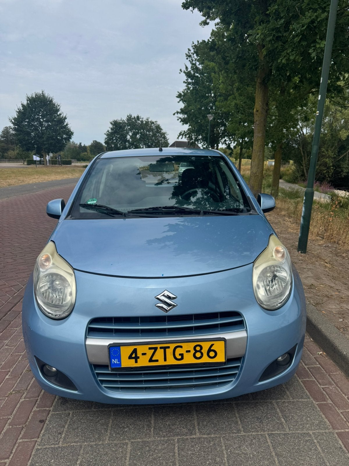 Suzuki Alto 1.0 2012 Blauw, Voorwielaandrijving, Stof, 200 kg, Handgeschakeld