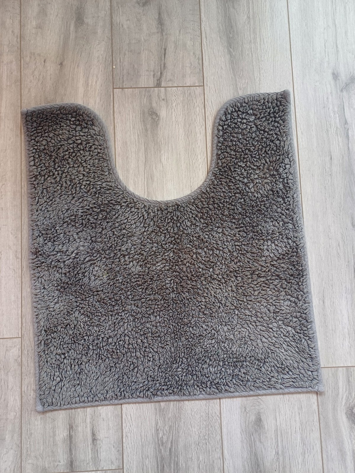 Donkergrijs toiletmatje, 55x60 cm, rubberen achterkant, Gebruikt, 50 tot 100 cm, 50 tot 100 cm, Ophalen of Verzenden