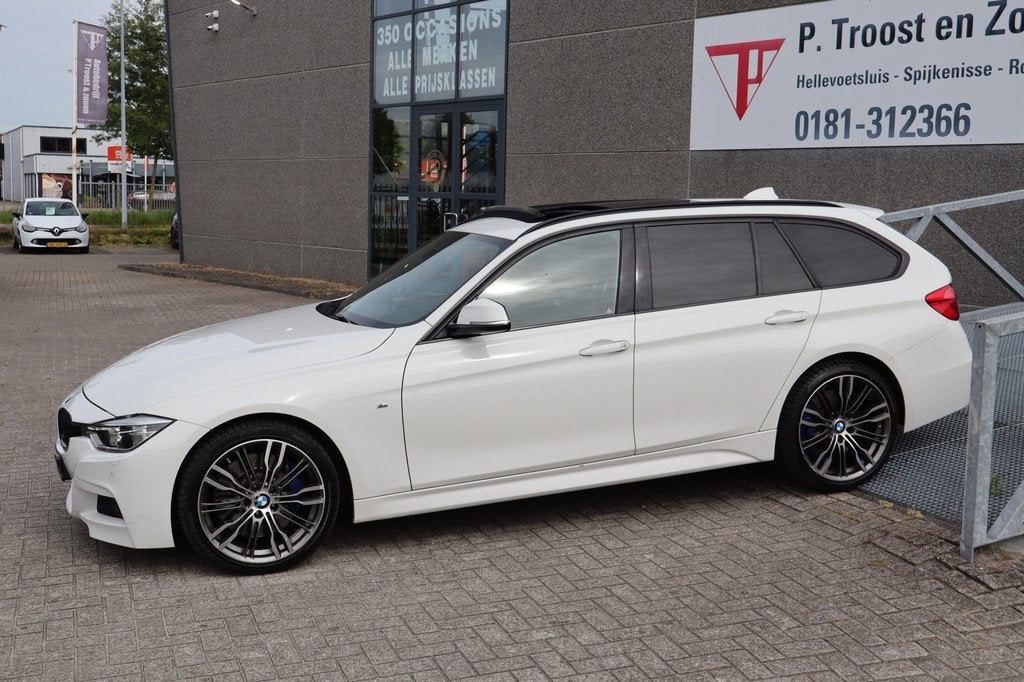 BMW 3 Serie Touring 340i xDrive Centennial High Executive M, Auto's, BMW, 12 maanden, 1655 kg, Wit, Leder