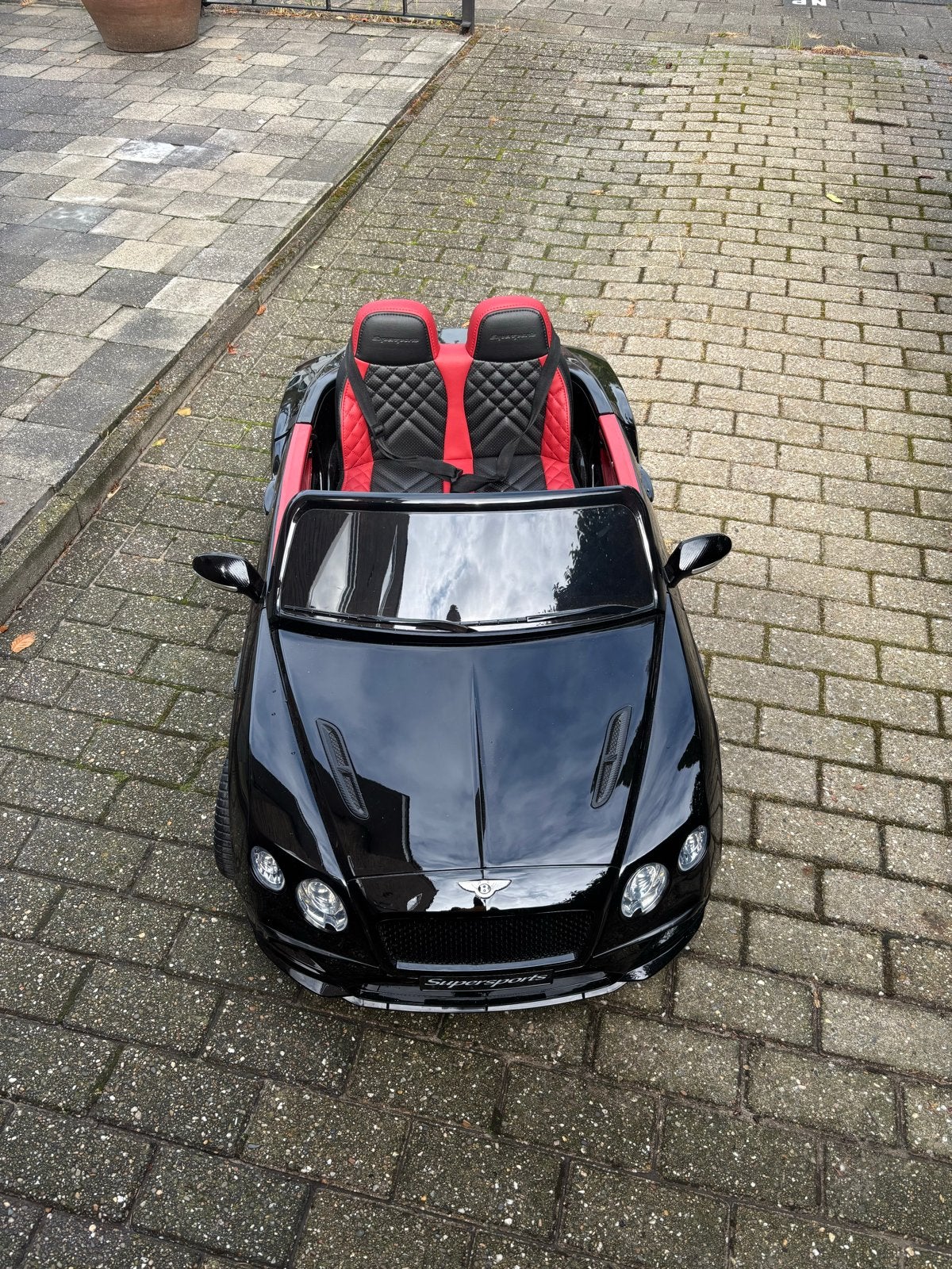 Elektrische kinderauto Bentley Supersports zwart, Ophalen, Zo goed als nieuw, Loopvoertuig