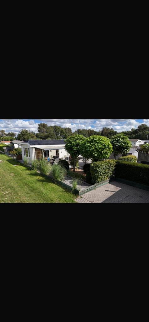 XL chalet op groot perrceel op eigen grond in Zeeland, Caravans en Kamperen, Stacaravans, Tot en met 4
