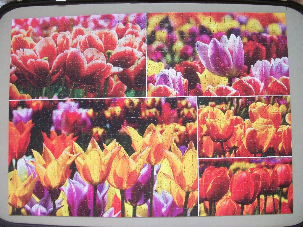 4x Puzzel - Tulpen - Stad aan Zee - 1000 - zgan - p.stuk, Ophalen of Verzenden, 500 t/m 1500 stukjes, Nieuw, Legpuzzel
