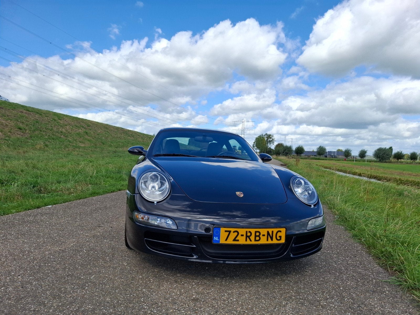 Porsche 911 3.8 Carrera S Coupe 2005 Zwart, Auto's, Achterwielaandrijving, 4 stoelen, Zwart, Origineel Nederlands