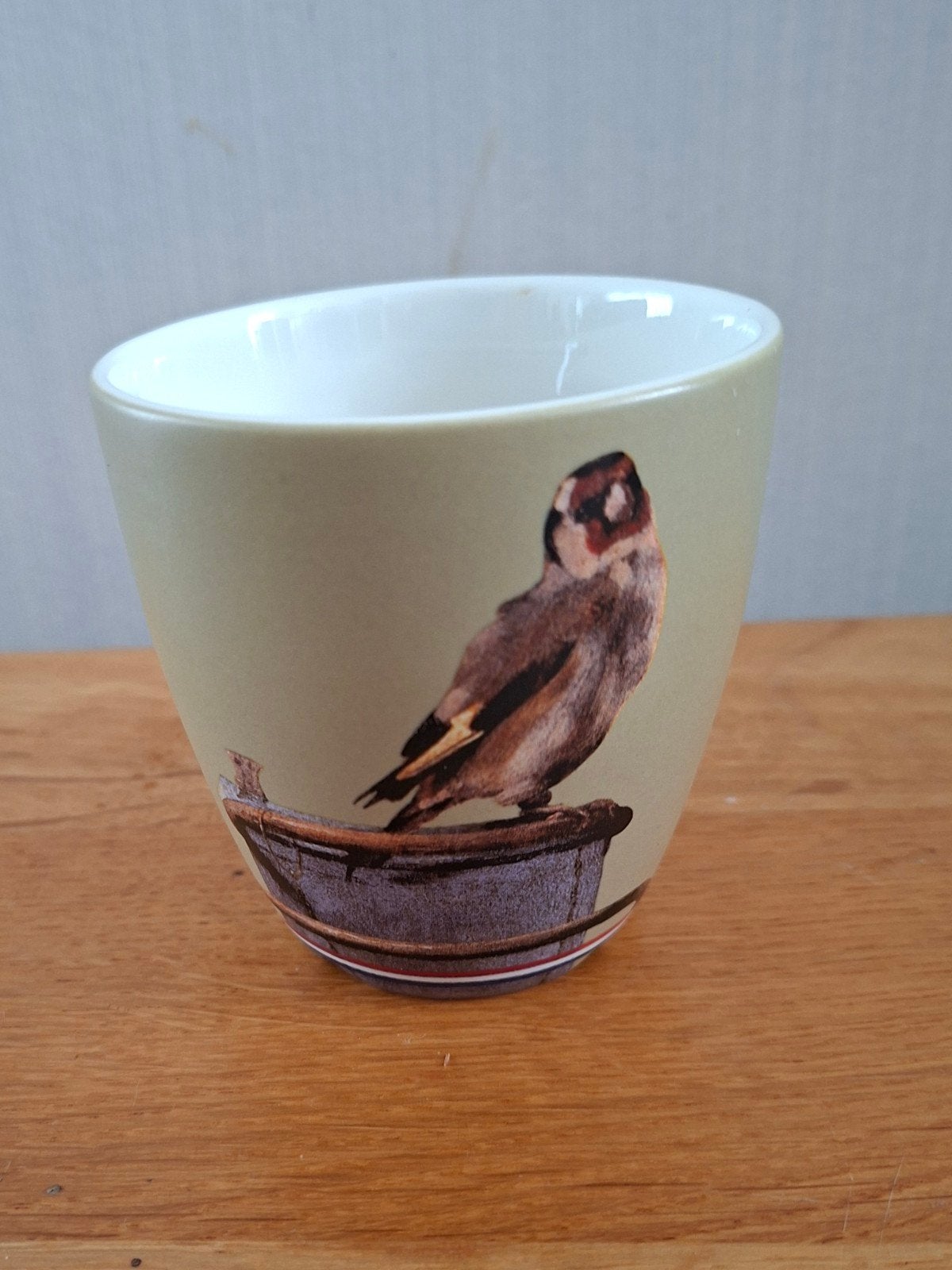 Collectors item DE mok "het puttertje" Carel Fabritius 1654, Ophalen of Verzenden, Nieuw, Overige stijlen, Kop(pen) en/of Schotel(s)