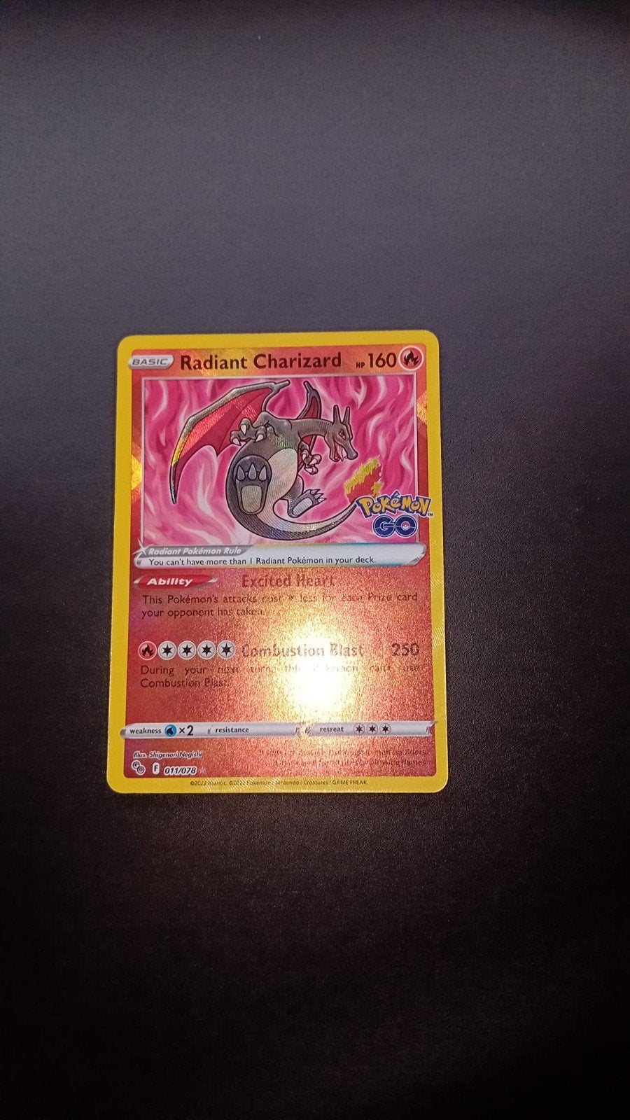 Pokémon TCG: Radiant Charizard (011/078) - Pokémon GO, Ophalen of Verzenden, Zo goed als nieuw, Losse kaart, Foil
