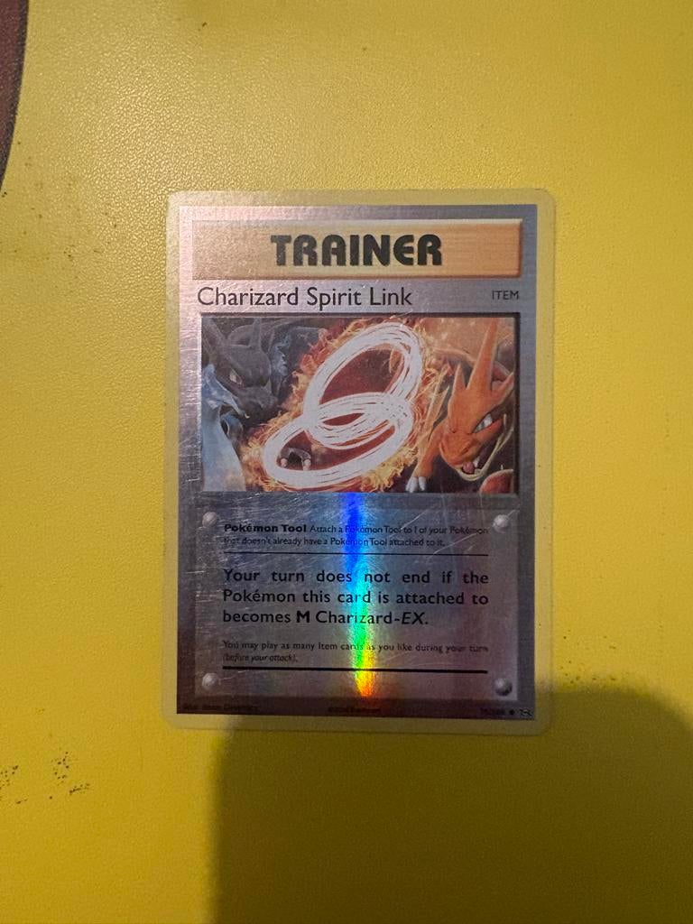 Pokémon Charizard Spirit Link Trainer Kaart Foil, Ophalen of Verzenden, Zo goed als nieuw, Losse kaart, Foil