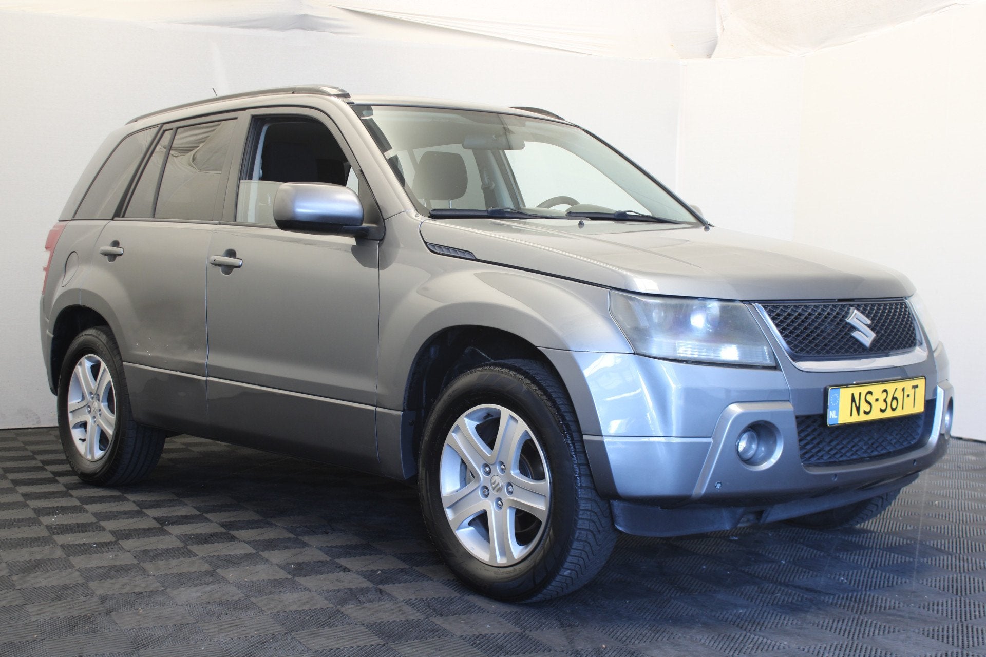Suzuki Grand Vitara 2.0-16V JLX (bj 2007, automaat), Auto's, Automaat, Stof, 4 cilinders, Grand Vitara