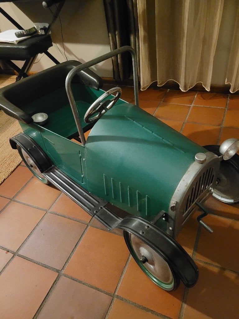 Leuke vintage trapauto, Ophalen
