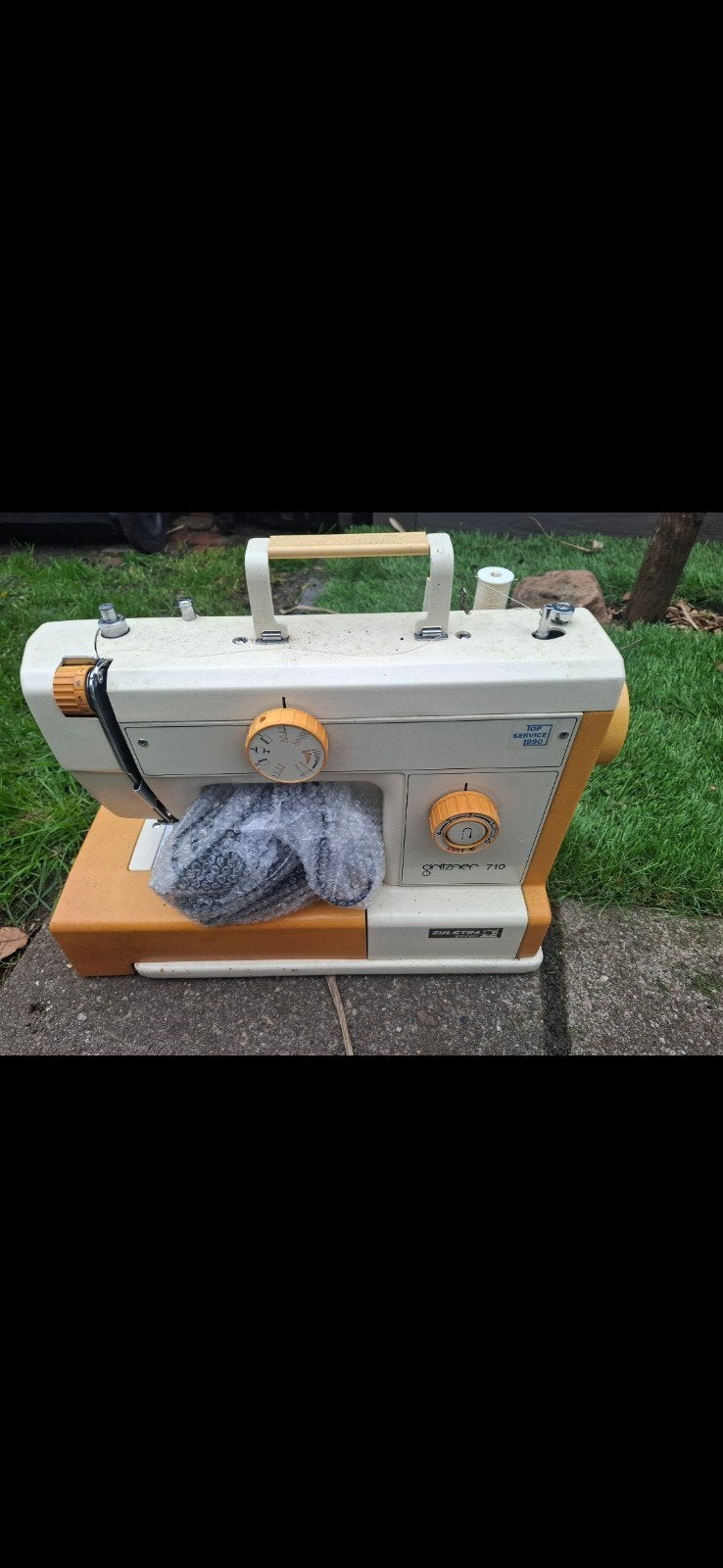 naaimachine, Ophalen