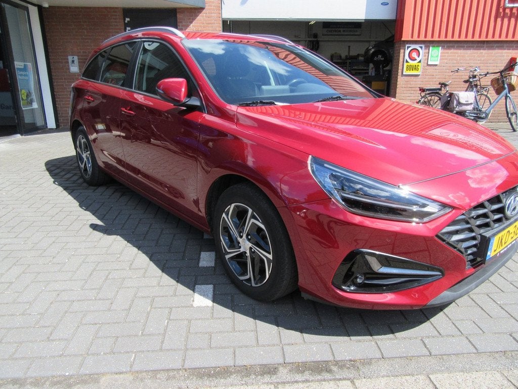 Hyundai I30 1.5 T-GDi MHEV Premium Sky, Auto's, Hyundai, Gebruikt, 4 cilinders, Leder en Stof, Bedrijf