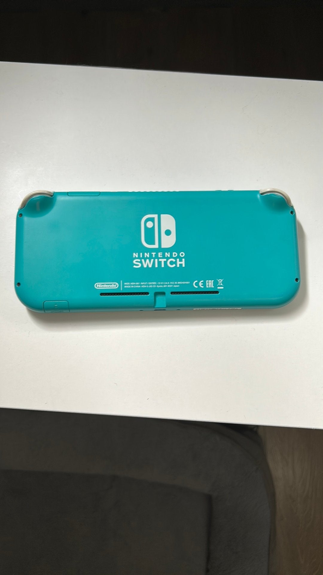 Nintendo switch lite lichtblauw+ een spelletje, Spelcomputers en Games, Spelcomputers | Nintendo Switch Lite, Ophalen, Gebruikt