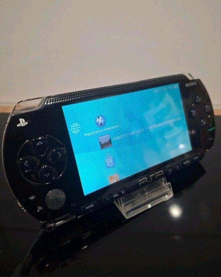 PSP 1004 - 4 Games - Opberghoes - memorycard, Ophalen of Verzenden, PSP