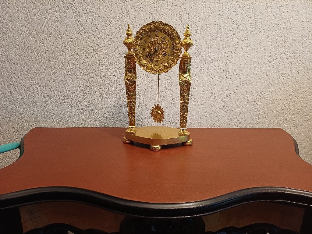 Kolompendule, vuurverguld brons, Ophalen