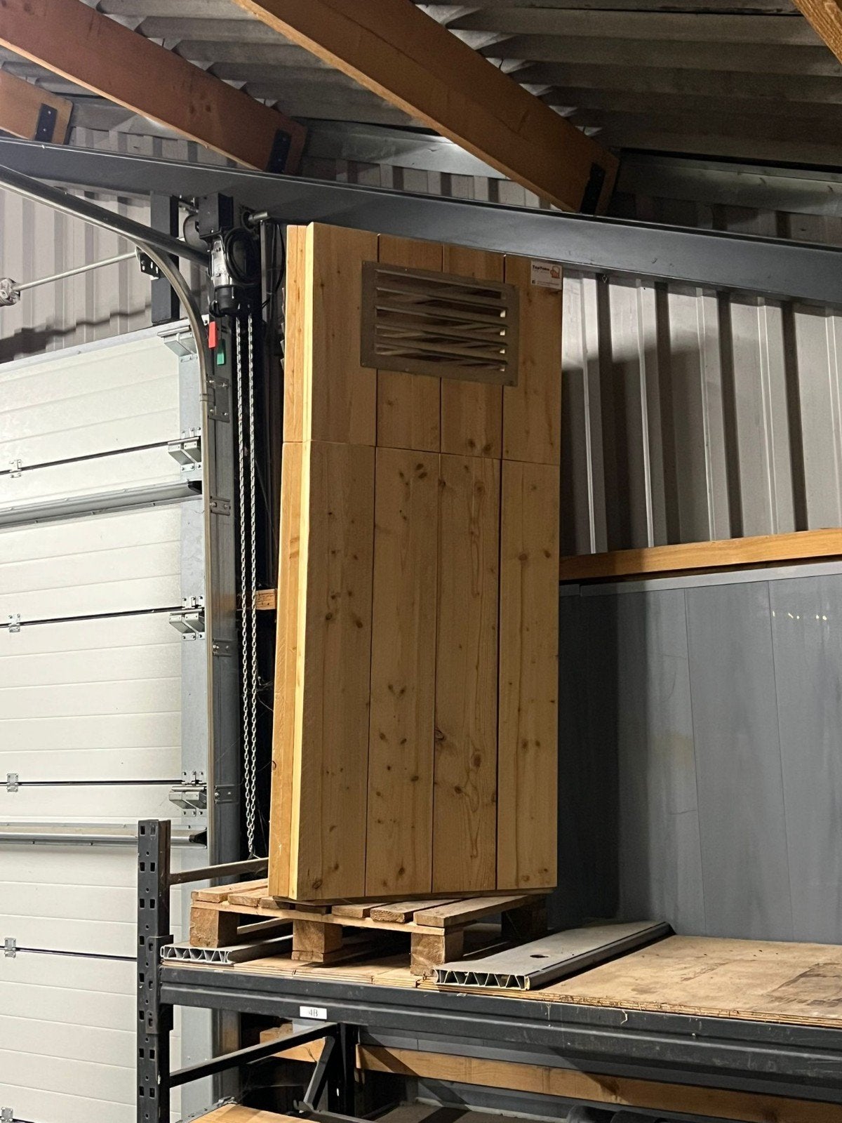 Steigerhouten inblaas kast, Ophalen