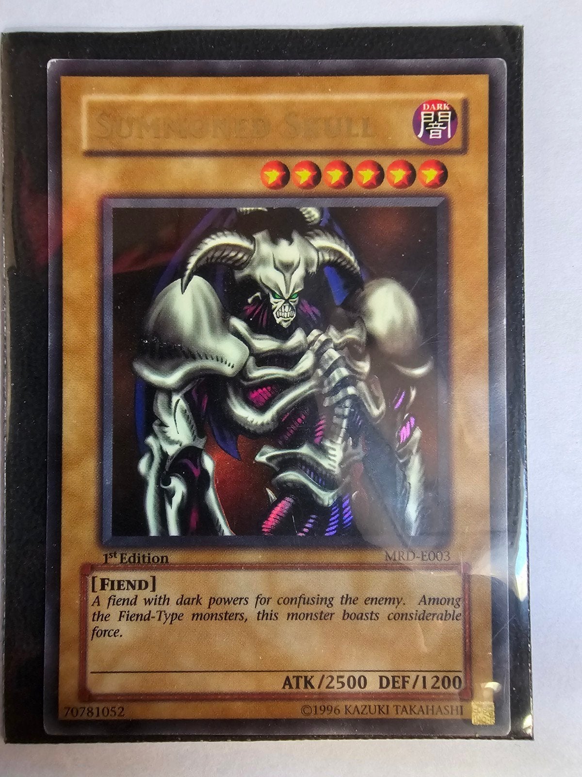 Yu-Gi-Oh! Summoned Skull 1st Edition MRD-E003 Graded, Verzenden, Zo goed als nieuw, Losse kaart, Foil