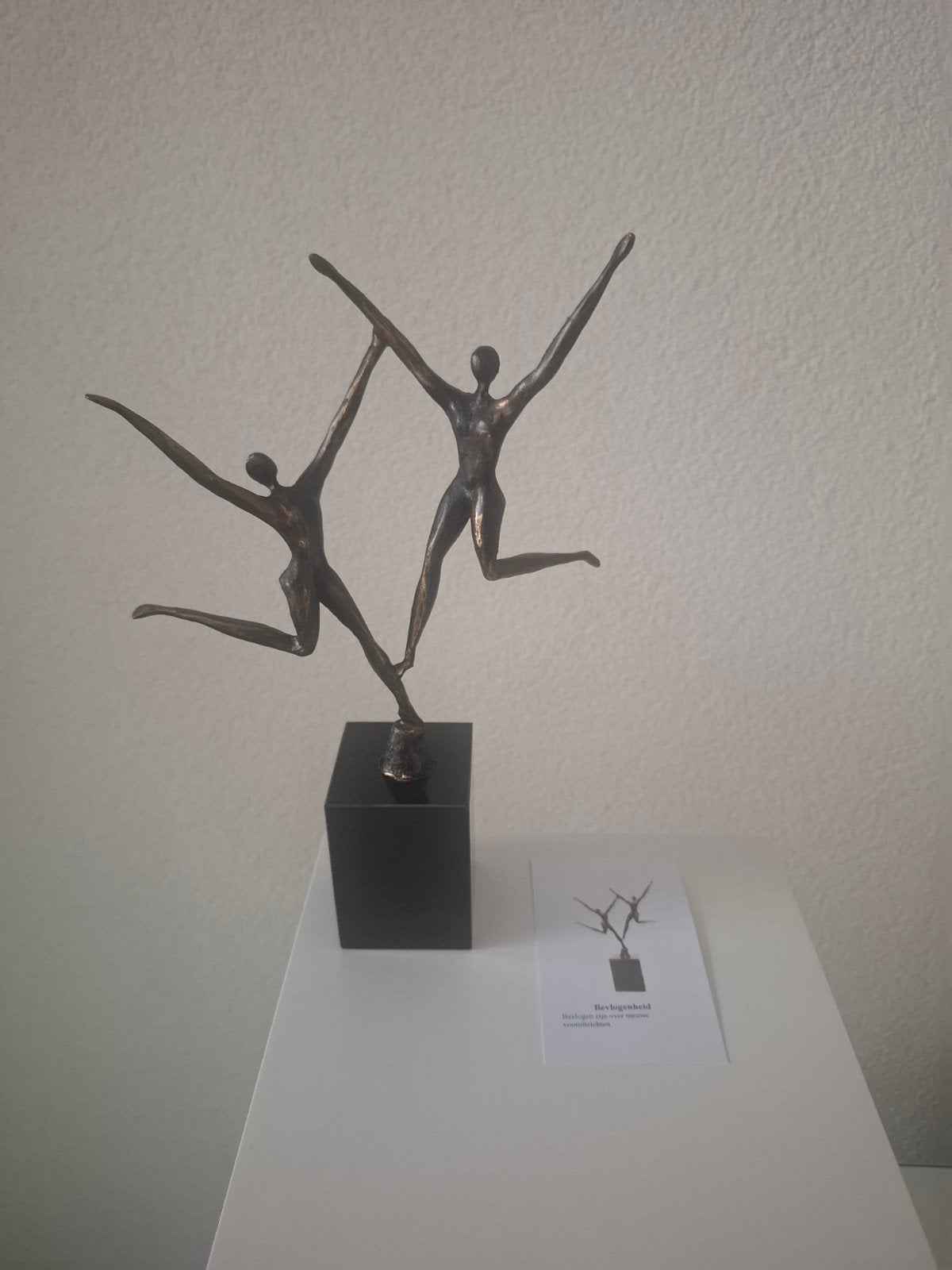 Het kunstsculptuur "Bevlogenheid" van Ger van Tankeren, Antiek en Kunst, Kunst | Designobjecten, Ophalen of Verzenden, Beeld, Metaal