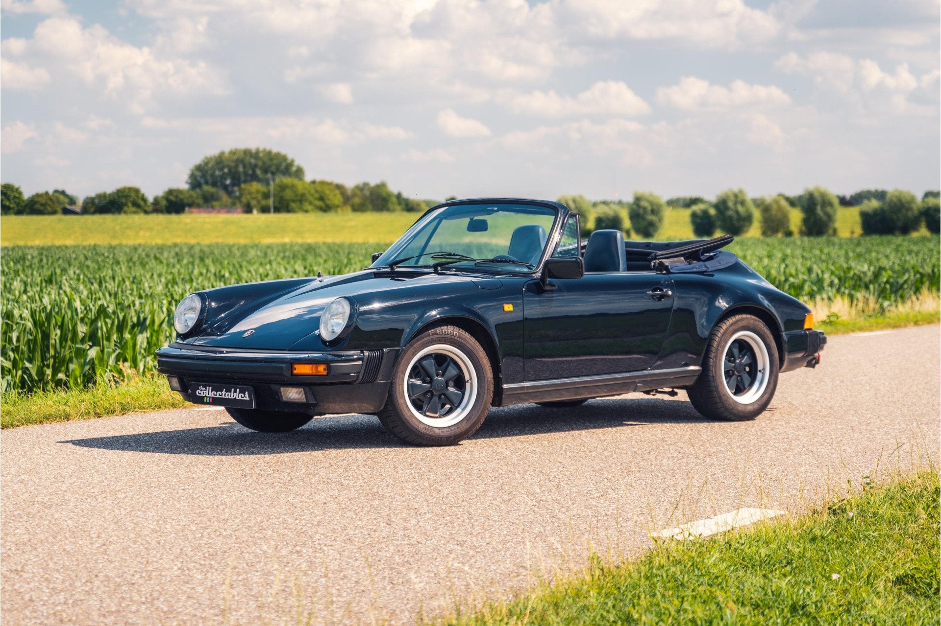 Porsche 911 Cabrio 3.2 231pk (bj 1986), Auto's, Cabriolet, Blauw, Leder, Bedrijf