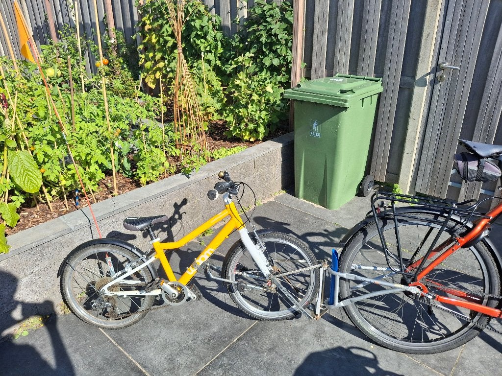 Woom 4 + FollowMe tandem koppeling zeer compleet, Ophalen, 20 inch of meer, Gebruikt, Velgrem