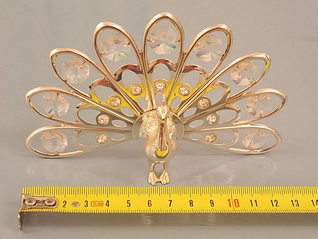 Swarovski  pauw zilverkleurig, Ophalen of Verzenden, Sieraad of Horloge