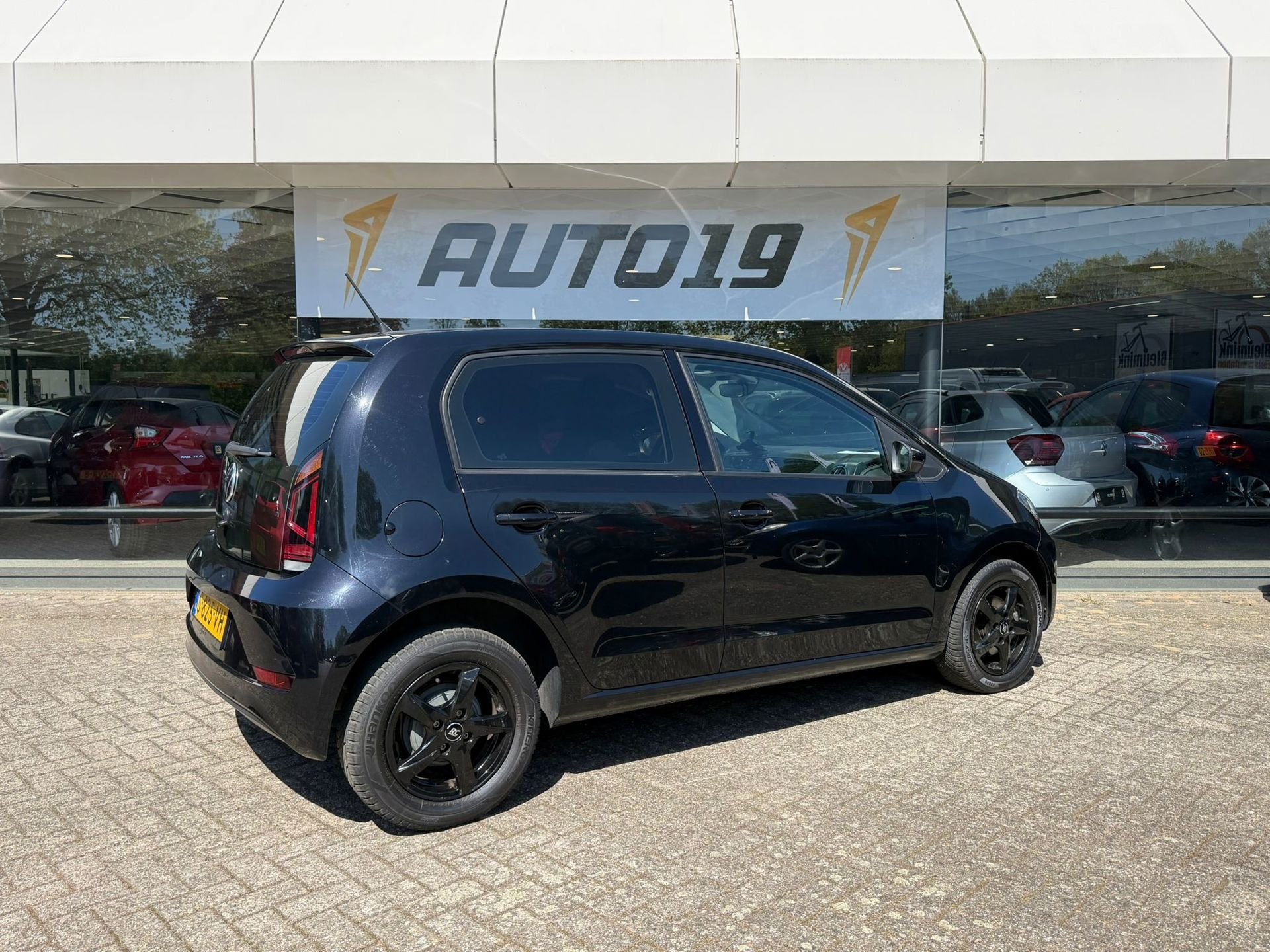 Volkswagen Up! 1.0, Auto's, Stof, Gebruikt, 4 stoelen, Bedrijf