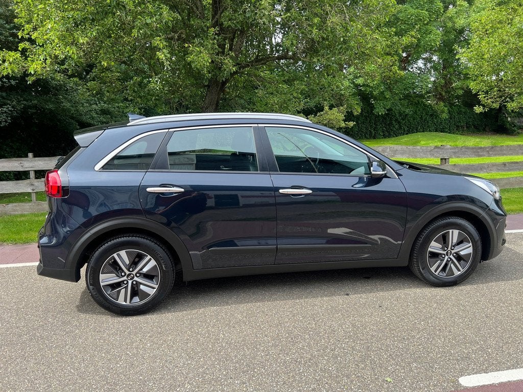 Kia Niro 1.6 GDi Hybrid DynamicLine Automaat Clima Navi, Auto's, Kia, Automatische klimaatregeling, Gebruikt, Blauw, Leder en Stof