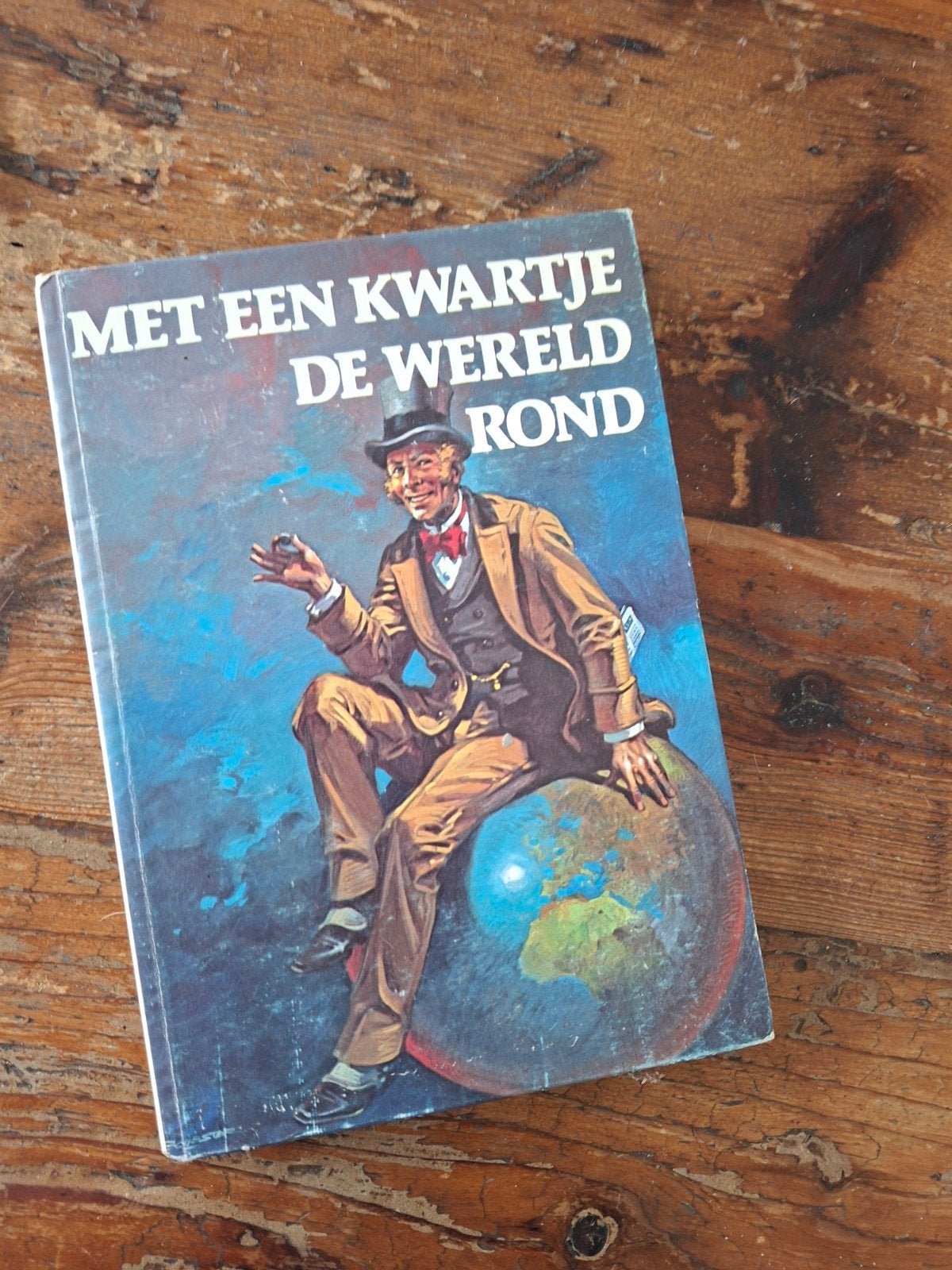 boek met een kwartje de wereld rond bijna gratis, Boeken, Ophalen of Verzenden, Zo goed als nieuw