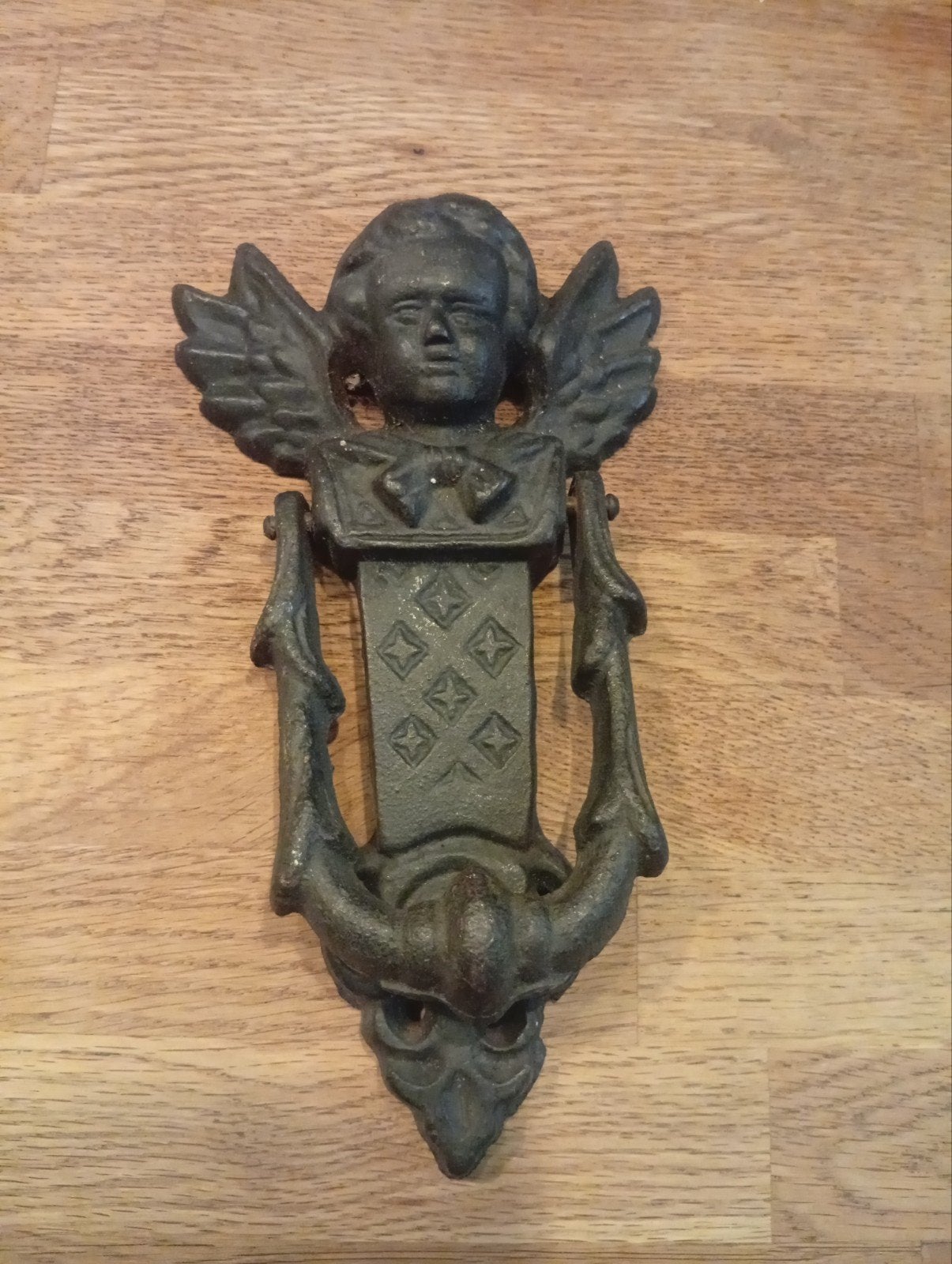 Antieke gietijzeren deurklopper met engel, Ophalen of Verzenden