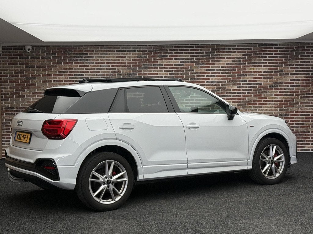 Audi Q2 35 TFSI S Edition S Line Panoramadak Stoelverwrm, Auto's, Audi, Voorwielaandrijving, 4 cilinders, 150 pk, Leder en Stof