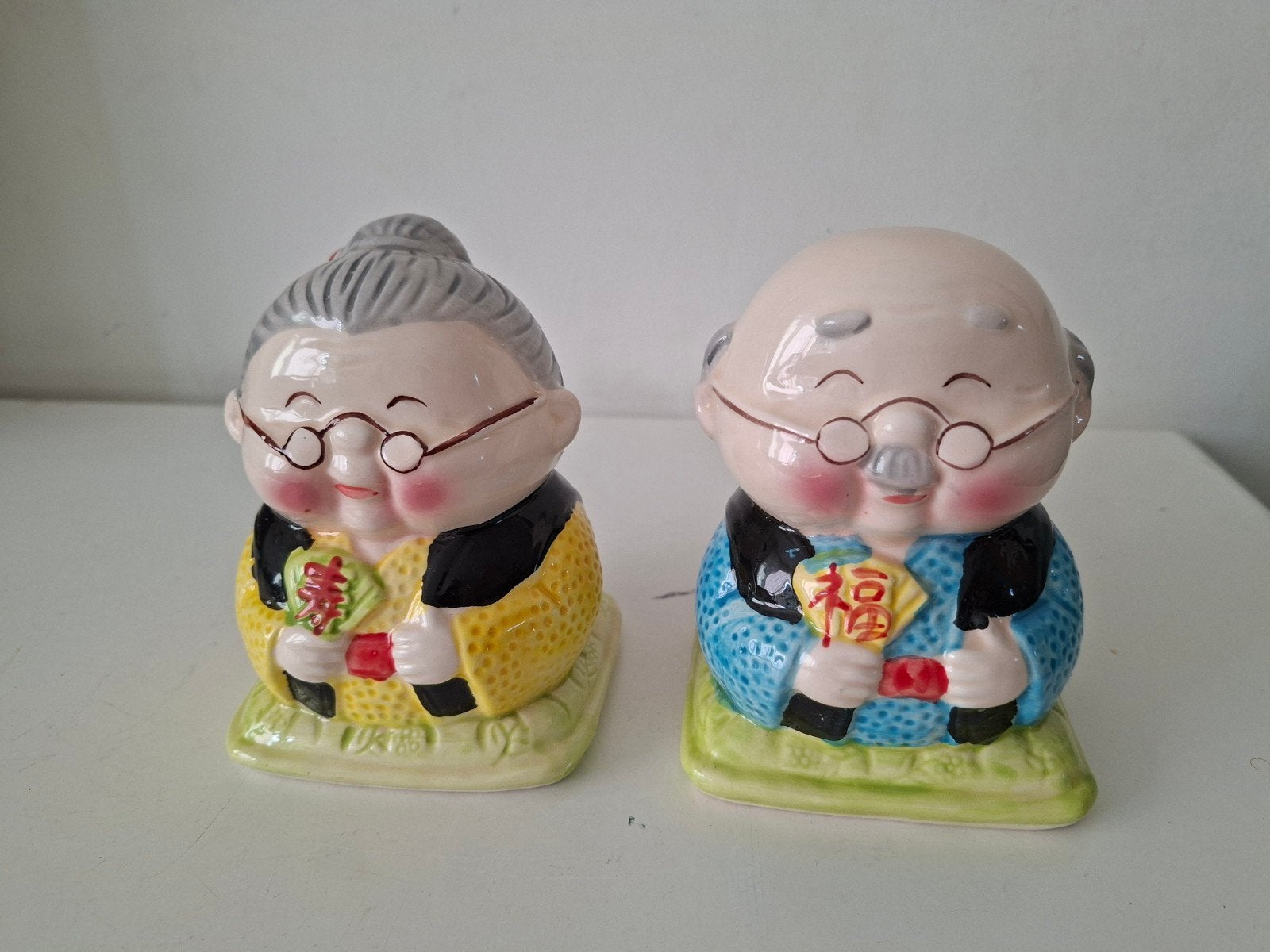 Set van 2 spaarpotten opa, oma Aziatisch, Gebruikt, Meerkleurig, Ophalen of Verzenden, Oosters