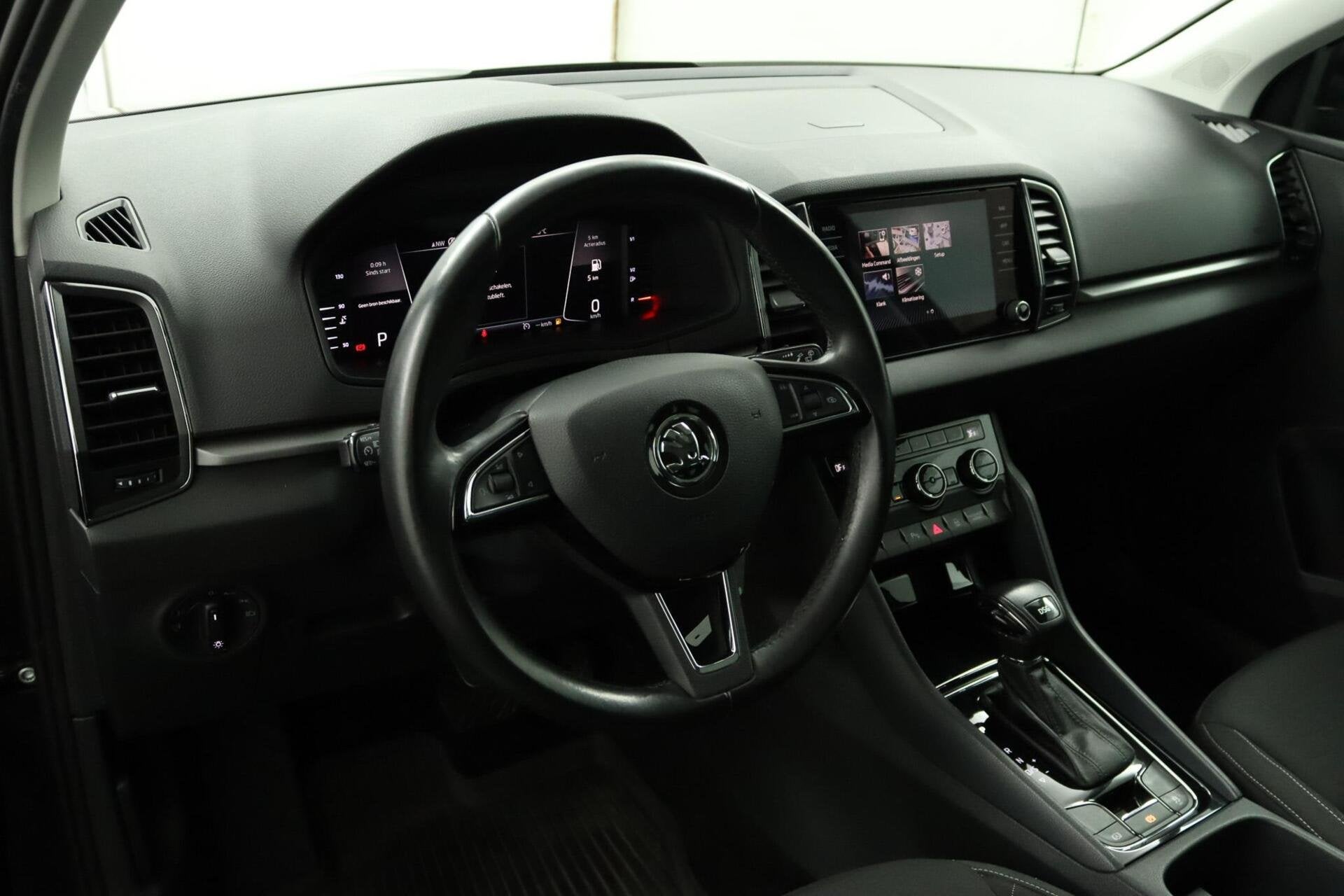 Skoda Karoq 1.0 TSI Ambition Busines Camera - Airco - Cruise, Auto's, Stof, Gebruikt, 1261 kg, 116 pk