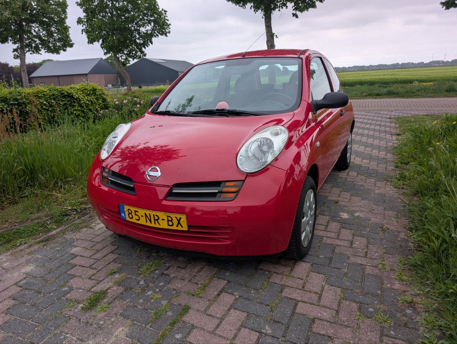 Nissan Micra 1.2 59KW 3DR 2004 Rood, Auto's, Nissan, Voorwielaandrijving, 31 €/maand, 4 cilinders, Origineel Nederlands