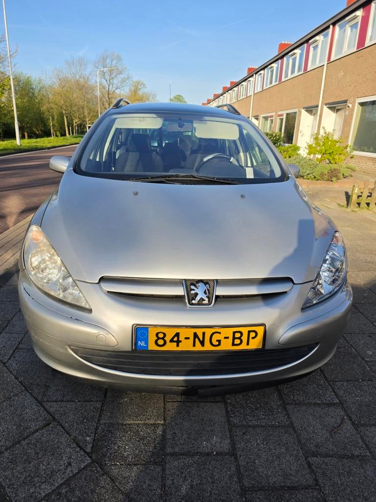Peugeot 307 sw 7 persoons grijs, Auto's, Peugeot, 1330 kg, Stof, Zwart, 4 cilinders