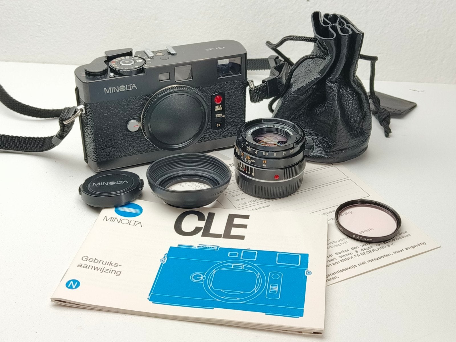 Minolta CLE met M-Rokkor 40mm f/2 lens en accessoires, Ophalen of Verzenden, Zo goed als nieuw, Compact, Minolta