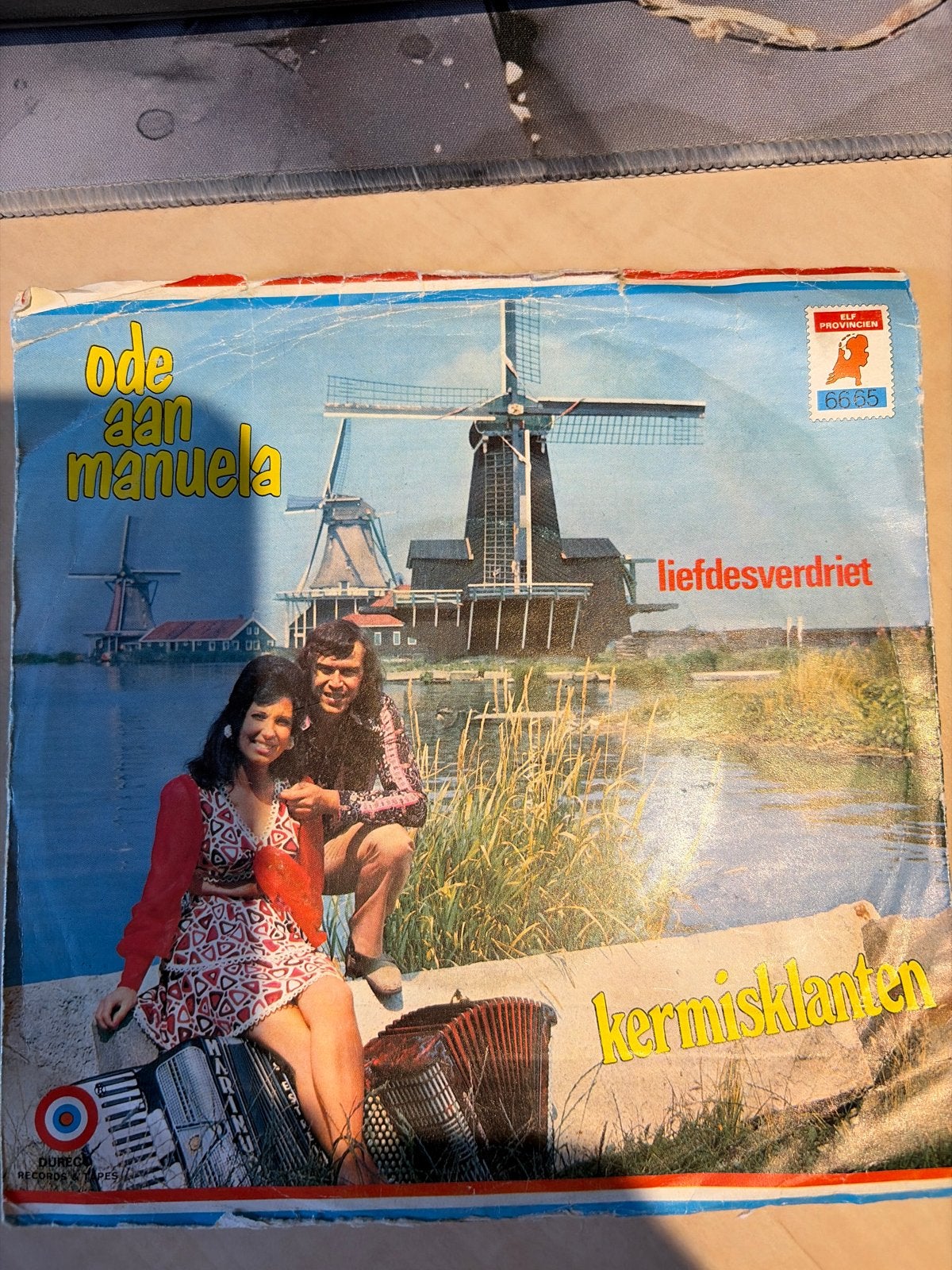 De Kermisklanten - Ode aan Manuela / Liefdesverdriet (Vinyl), Gebruikt, 7 inch, EP, Fotohoes