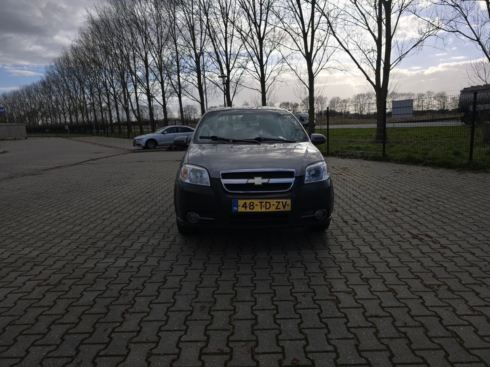 Chevrolet Aveo 1.4 16V 4D AUT 2006 Grijs, Auto's, Chevrolet, 1027 kg, 40 €/maand, Aveo, 4 cilinders