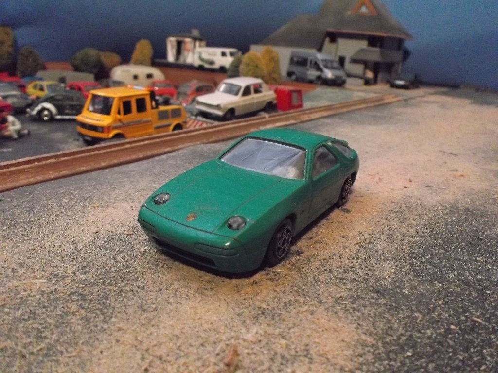 1:43 Porsche 928 - Bburago groen, Hobby en Vrije tijd, Ophalen of Verzenden, Zo goed als nieuw, Auto, Overige merken