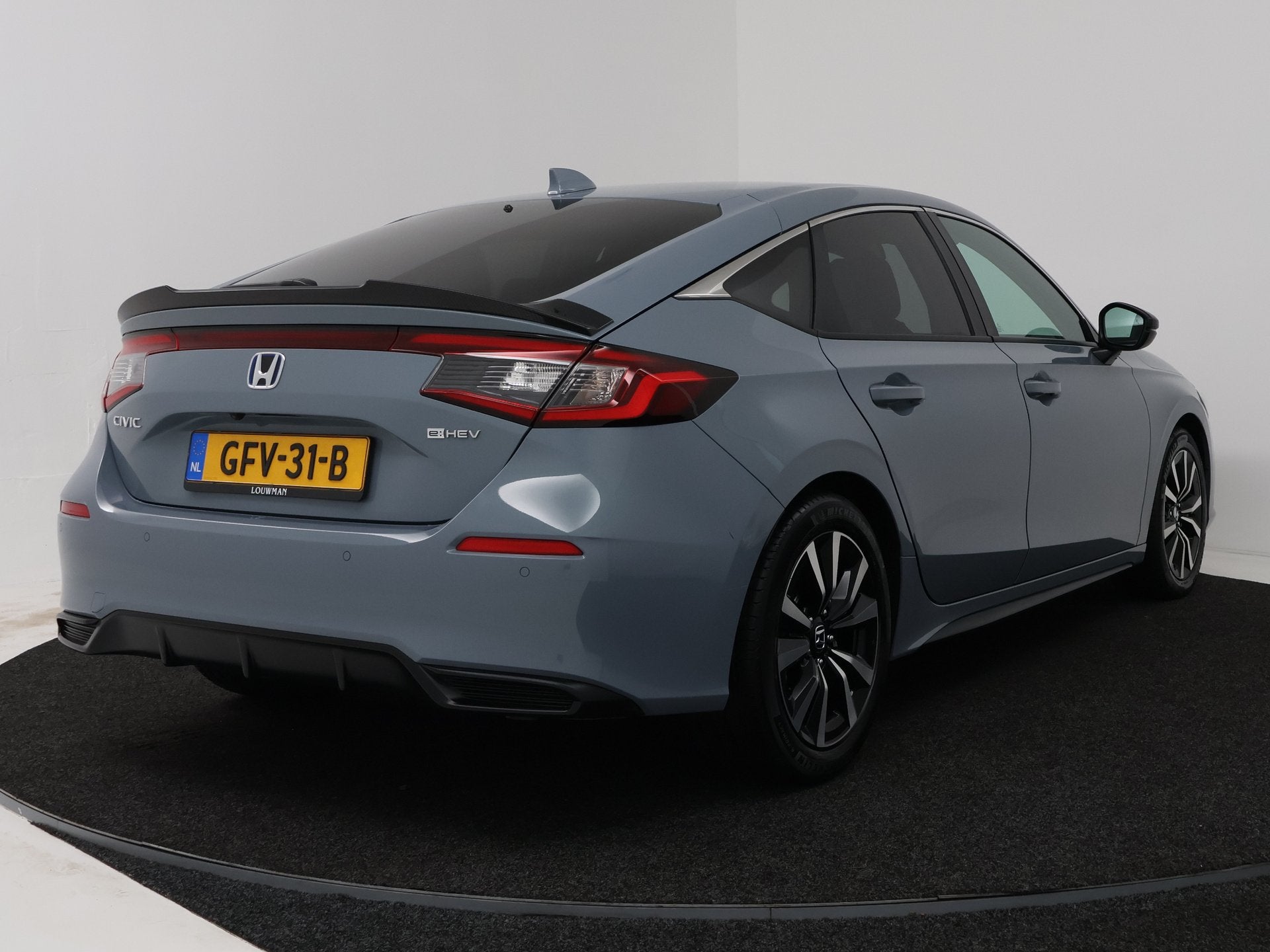 Honda Civic 2.0 e:HEV Elegance (bj 2024, automaat), Stof, Gebruikt, 4 cilinders, Automatische klimaatregeling