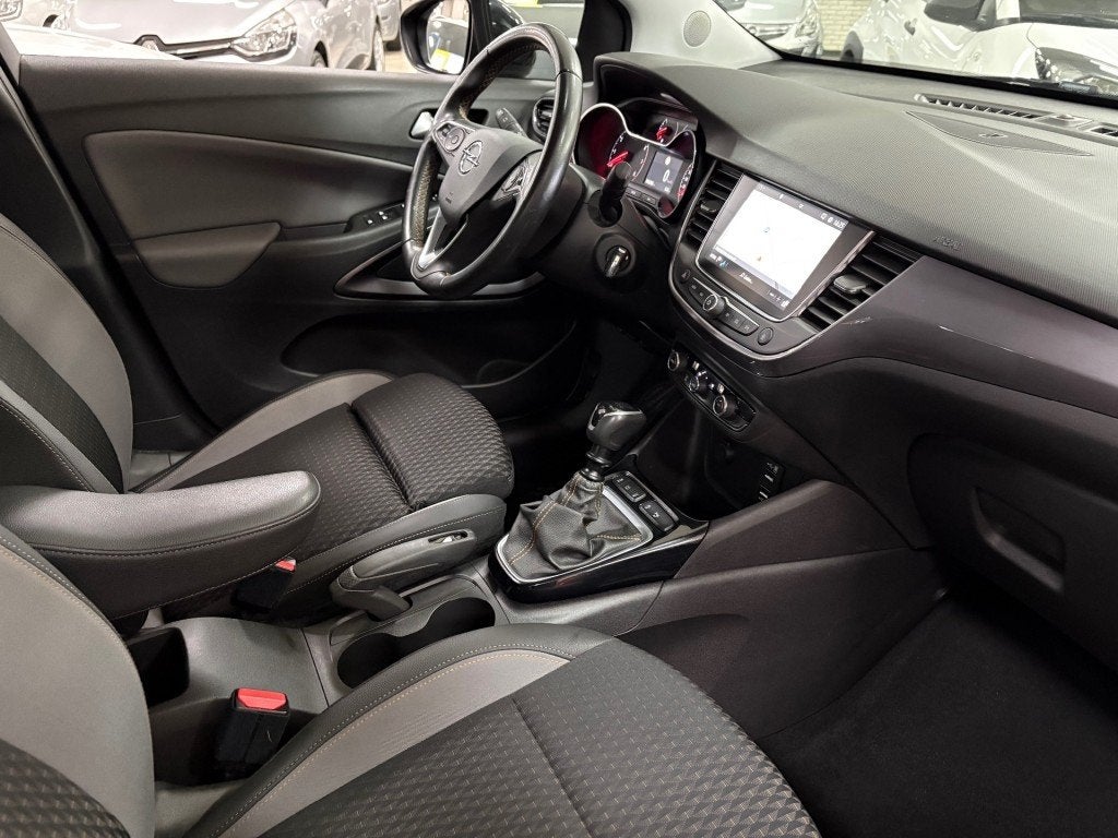 Opel CROSSLAND X 1.2 T. INNOVATION Navigatie Half Leder Mult, Auto's, Opel, Gebruikt, 1199 cc, Met garantie (alle), Zwart