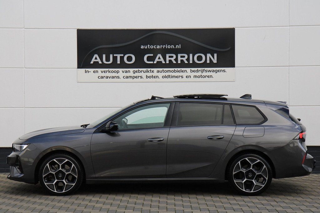 Opel Astra Sports Tourer 1.6 Turbo GS PHEV Pano HUD BTW !, Auto's, Opel, Gebruikt, 4 cilinders, 179 pk, Leder en Stof