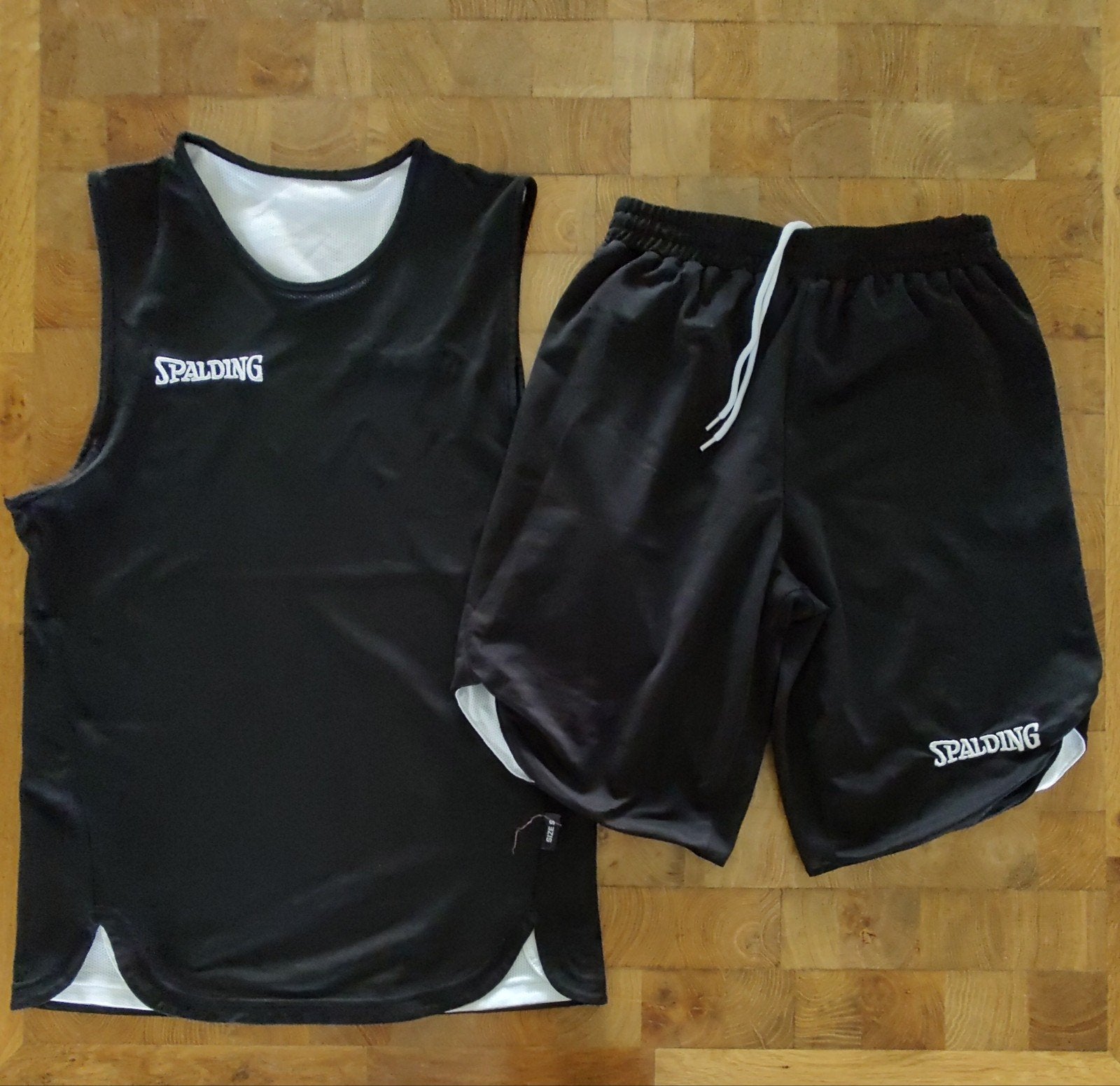 Spalding Basketbal Tenue S - Omkeerbaar Zwart/Wit, Ophalen of Verzenden, Zo goed als nieuw