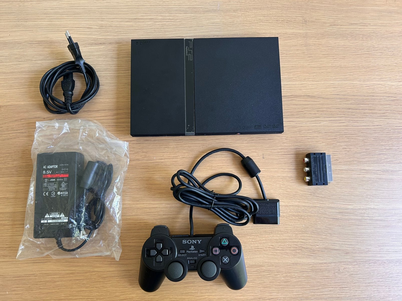 PlayStation 2 Slim (SCPH-79004) – ZGAN (Zie beschrijving), Zwart, Ophalen of Verzenden, Zo goed als nieuw, Met 1 controller
