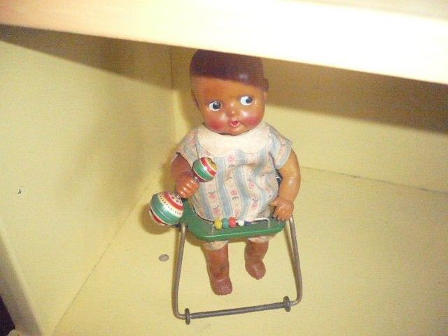 Mie18< blik/rubber opwindbaar baby ( jongen) in loopwagentje, Ophalen of Verzenden
