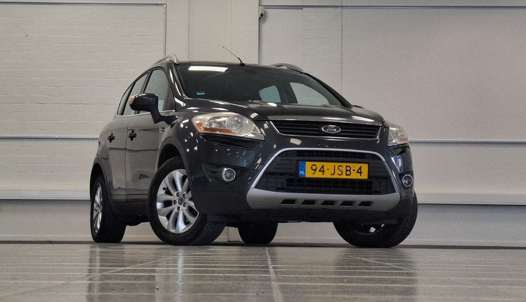 Ford Kuga 2.5i 20V Titanium 2e Eigenaar Trekhaak Navi AWD Pa, Auto's, Ford, Automaat, Gebruikt, Zwart, 1553 kg