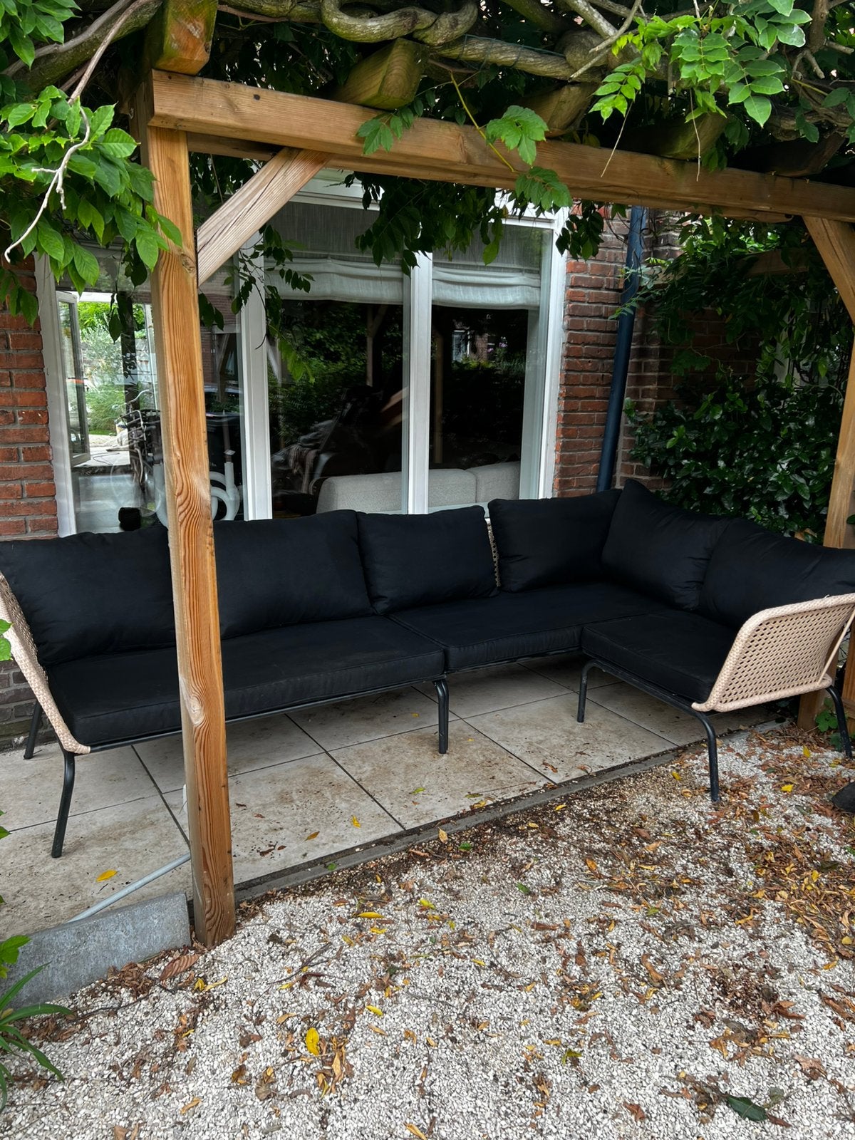 Zandkleurige L-vormige tuinset met kussens