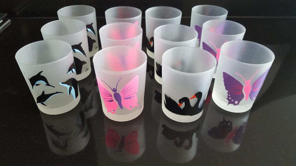 Nieuw 12 stuks frisdrank glazen met Vlinders Zwanen en Dolfi, Verzamelen, Ophalen of Verzenden, Nieuw, Bierglas