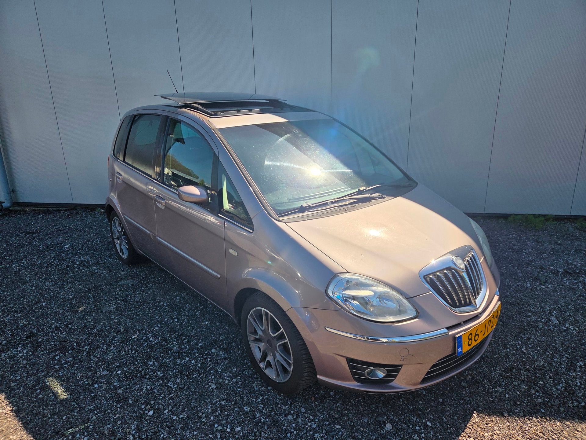 Lancia Musa 1.4-16V Platino | Leer | Dak | Airco | PDC | Cru, Auto's, Voorwielaandrijving, 15 km/l, Gebruikt, Bruin