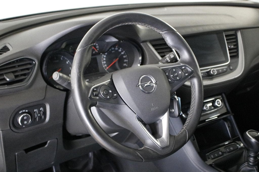 Opel Grandland X 1.2 Turbo 120 Jaar Edition Distr. Riem V.V., Auto's, Opel, Voorwielaandrijving, Stof, Gebruikt, Euro 6