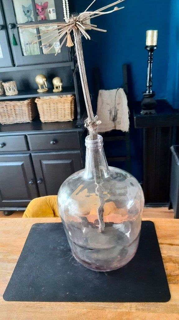 brocante gistfles, Ophalen