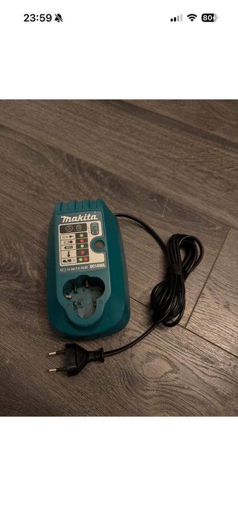 Te koop splinternieuwe Makita DC10WA 7.2V 10.8V Li-Ion lader, Ophalen of Verzenden, Zo goed als nieuw