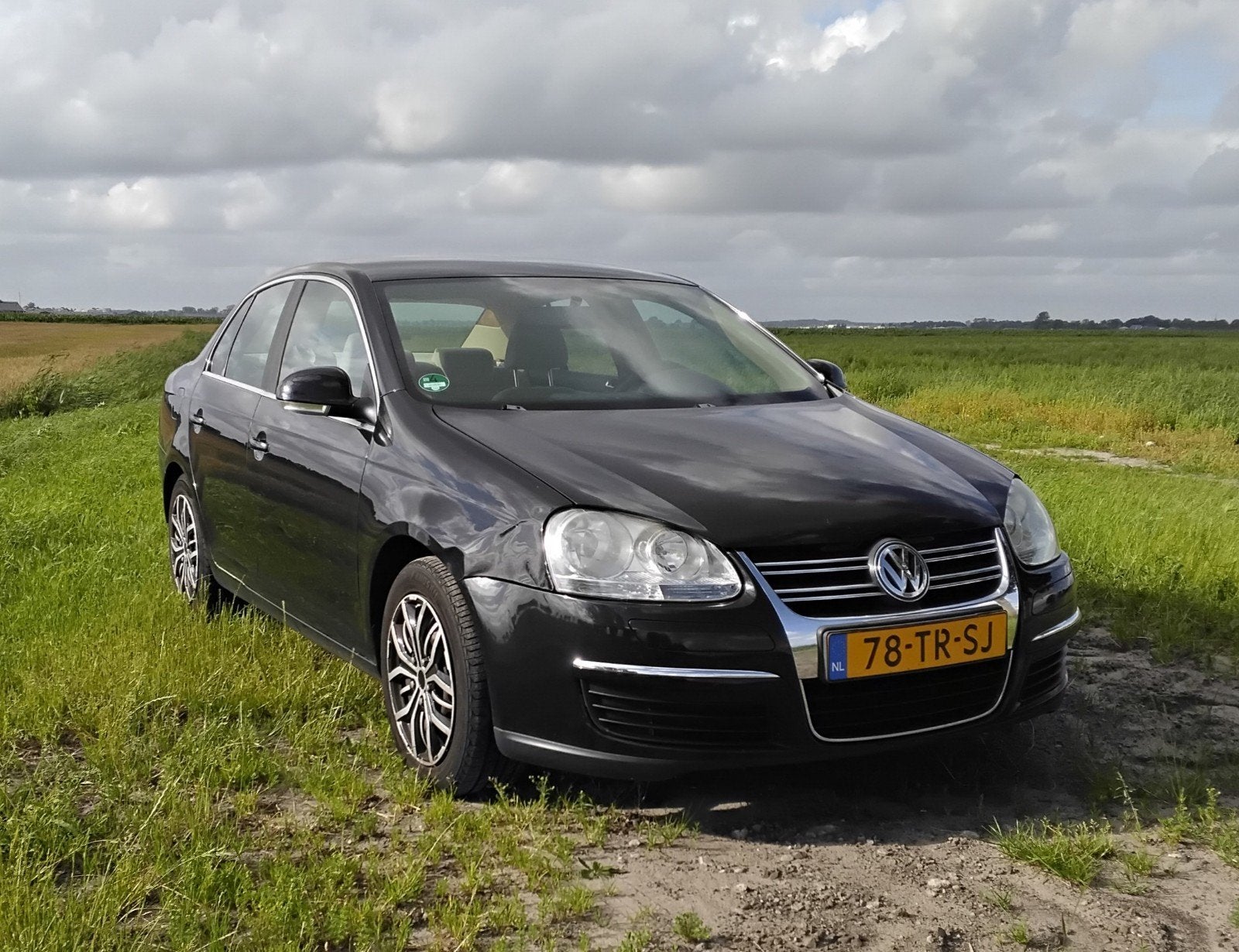 Volkswagen Jetta 1.9 TDI Comfortline Business - 2007 - Zwart, Auto's, Volkswagen, Beige, Zwart, Origineel Nederlands, 19 km/l